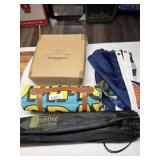 Lot of mats signs and floating beer cooler