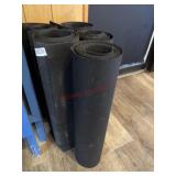 Five 20 foot long rolling mats