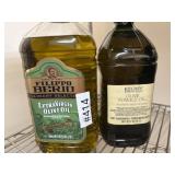 Two containers of olive oil