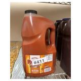 Three containers Frankï¿½s, red, hot wing sauce,