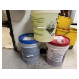 Three  jugs of dishwasher machine detergent.