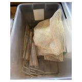 Tote of skewers and non slip mats for cabinets