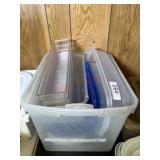 Tote of Rubbermaid storage containers and cracker