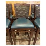 2- Wood bar stools with green seats and backs