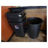 Four outdoor trash cans