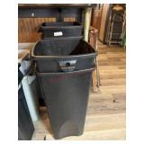 Five squared trash cans