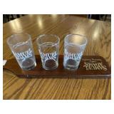 Samual Adamï¿½s serving paddle with glasses