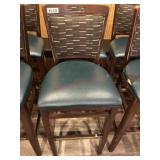 2- Wood bar stools with green seats and backs