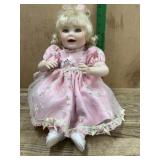Marie Osmond 16 inch porcelain doll in pink dress
