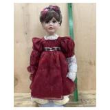 Marie Osmond 23 inch porcelain doll in red dress