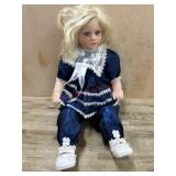 Royal Vienna vinyl 23 doll in blue outfit
