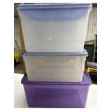 2 Clear and 1 purple storage totes with lids