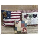 Flat with Boyds pillow and 2 quilted pillows