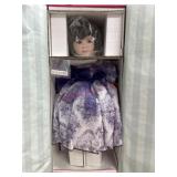 Marie Osmond 23 inch Porcelain doll in purple