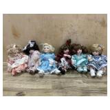 6- Marie Osmond porcelain cupcake dolls in blue,