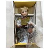Seymor Mann porcelain doll with hobby horse