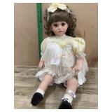 Royal Hiness 23 inch vinyl doll in yellow dress