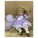 Marie Osmond 16 inch porcelain doll in purple