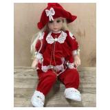 Royal Vienna 23 inch vinyl doll in red outfit
