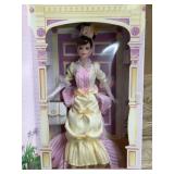 Avon Barbie doll in yellow dress
