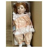 1991 Marci Cohen fussy porcelain doll in peach