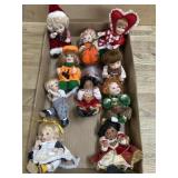 10  Small porcelain dolls