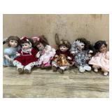 6- Marie Osmond porcelain cupcake dolls in pink