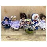 6- Marie Osmond porcelain cupcake dolls in purple