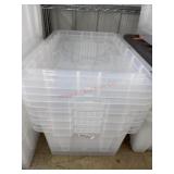 Four clear totes with lids two of four lids are