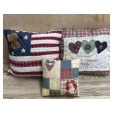 Flat with Boyds pillow and 2 quilted pillows