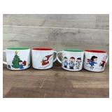 Four Ceramic Peanuts-Themed Mugs