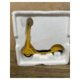 Yellow Electric Scooter in Styrofoam Packaging