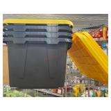 Four Black Storage Totes with Yellow Lids
