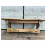 Wooden shelf w/ pegs