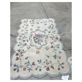 Floral rug approx 68 inches x 48 inches