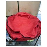Large red circular zipping bag