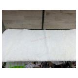Roughly 60ï¿½ bath mat