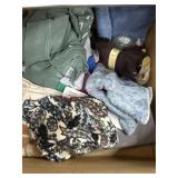 Box of towels and misc clothing