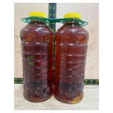 Two Bottles of Liquid Cleaner with Yellow Caps