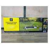 Oscillating Lawn Sprinkler with Adjustable Feature