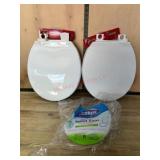 Three White Plastic Toilet Seats