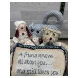 Box of stuffed doll, bear and pillow