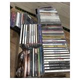 Flat of various genres music CDs