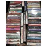 Flat of mixed genres music cassettes