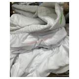 Stack of 4 twin mattress pads