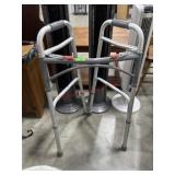 Adjustable folding walker