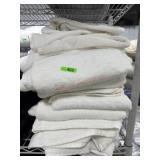Stack of white bath and hand towels