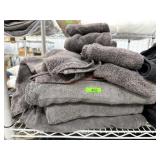Stack of grey bath towels and hand towels