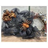 Black Halloween wreath and red and blue bead