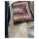 Braided rug and tan throw rug